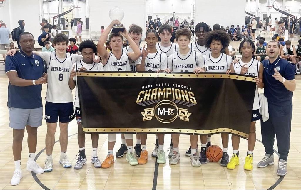 NY Rens youth players celebrating with a champions banner